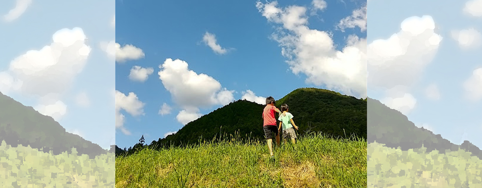 山の風景と子供の画像